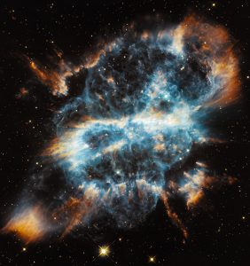 The NASA/ESA Hubble Space Telescope celebrates the holiday season with a striking image of the planetary nebula NGC 5189. The intricate structure of the stellar eruption looks like a giant and brightly coloured ribbon in space.