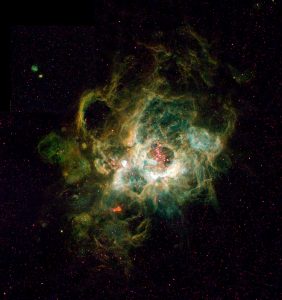 This is a Hubble Space Telescope image (right) of a vast nebula called NGC 604, which lies in the neighbouring spiral galaxy Messier 33, located 2.7 million light-years away in the constellation Triangulum.
